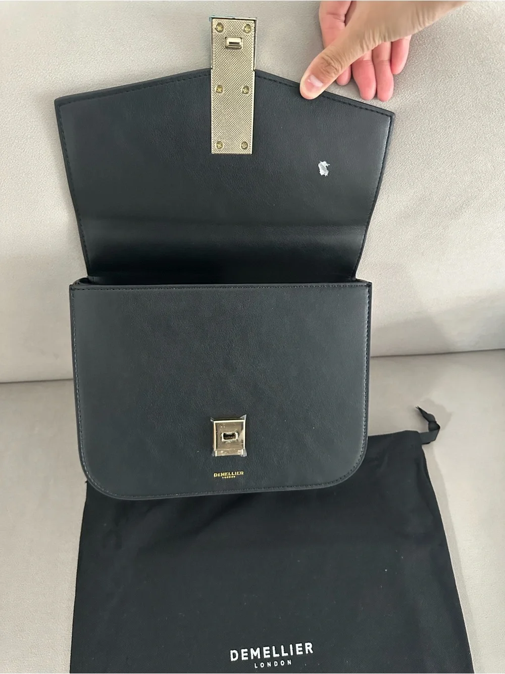 DeMellier sleek black